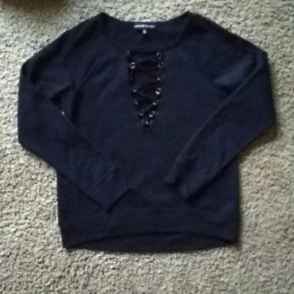 Almost Famous black  crew neck sweatshirt with lace up front. Size M